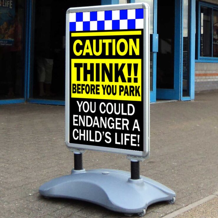 CAUTION Think before you park safety road sign