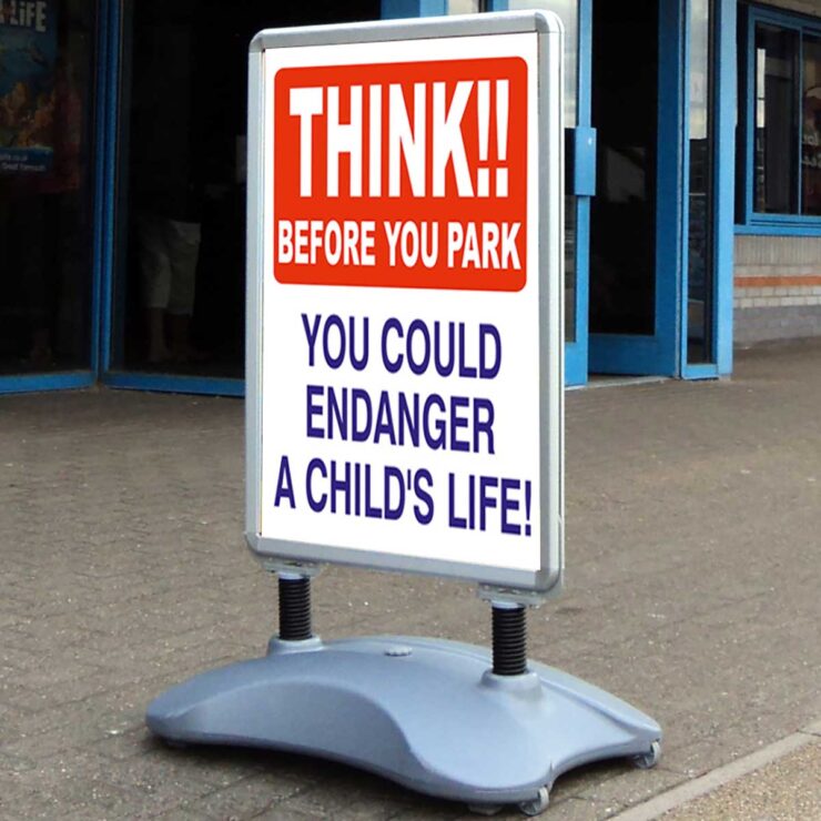 Think before you park safety pavement sign