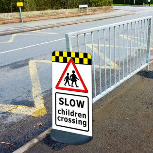 SLOW Children Crossing Road Safety Pavement Sign alternate image