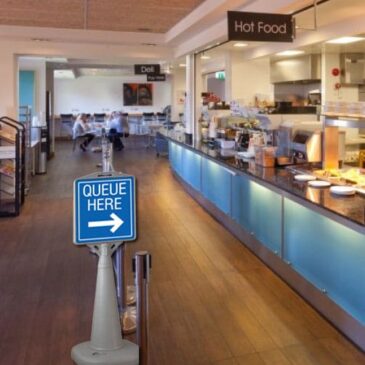 Queue Here Sign